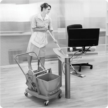 photo of a female cleaner cleaning the office floor with a mop